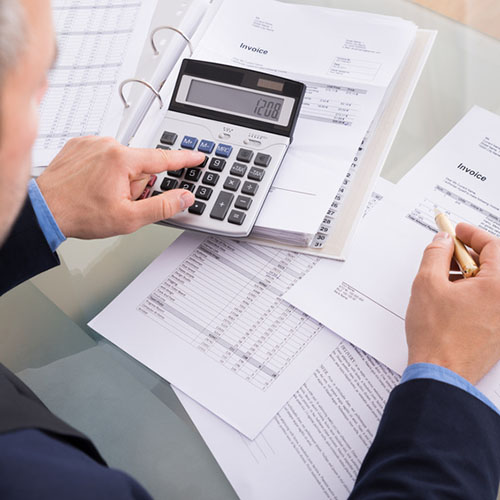 Businessman Doing Calculating